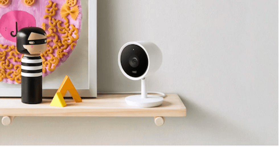 a photo of security camera on a shelf