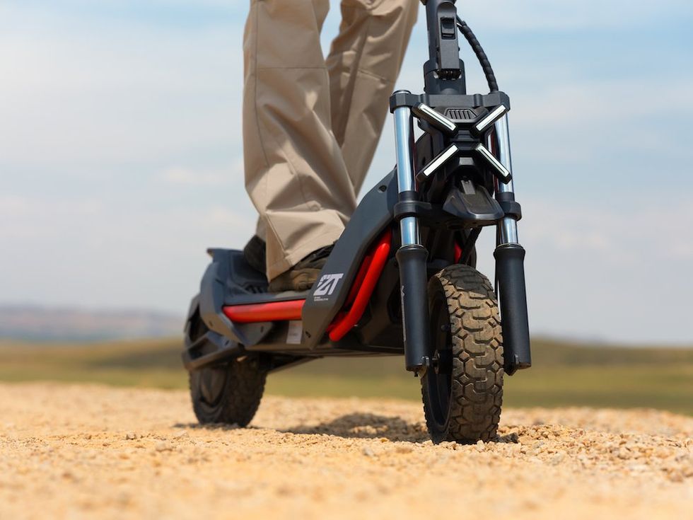 a photo of Segway ZT3 Pro All-Terrain eKickScooter on the ground