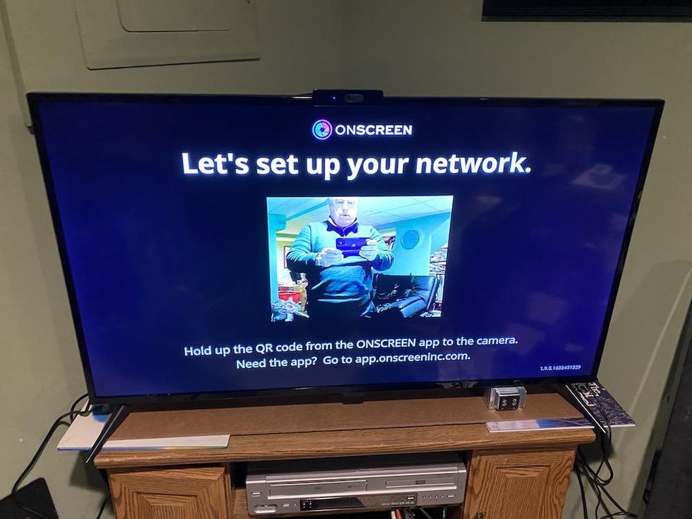 A photo of setting up ONSCREEN on a smart TV