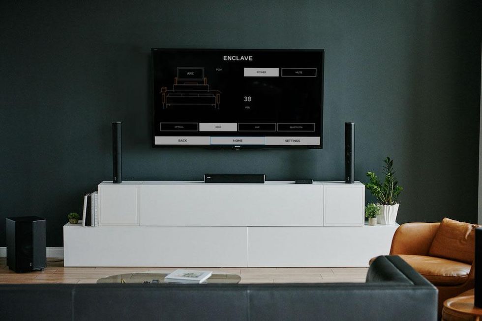 a photo of smart TV with Enclave Audio app on the screen