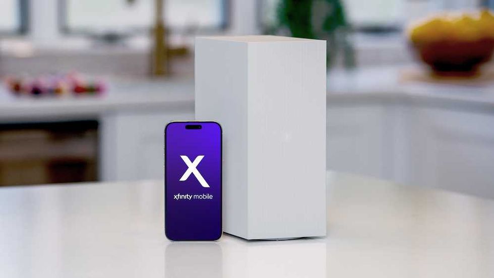 a photo of smartphone with xfinity mobile logo and xfinity gateway