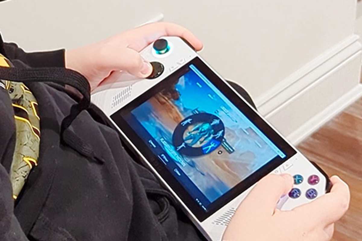 a photo of someone playing a game on Asus ROG ALLY (RC71L) handheld gaming PC