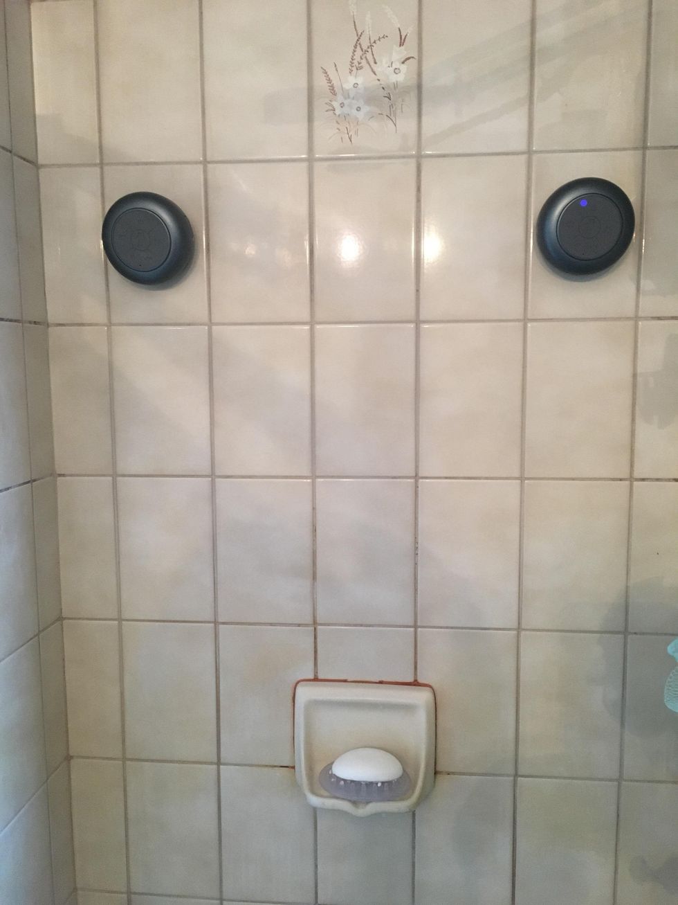 a photo of splash pro tunes shower speakers in a shower