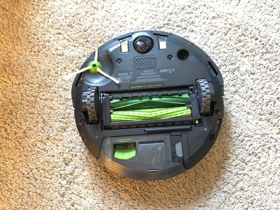 a photo of the bottom of irobot roomba i7+ robot vacuum