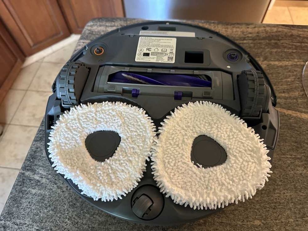 a photo of the bottom of the Narwal Freo robot vacuum