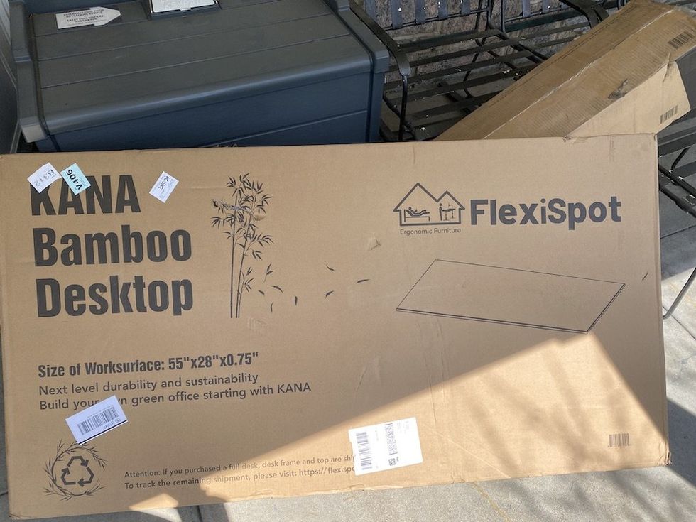 a photo of the boxes Flexispot E7 Pro Plus Standing Desk came in