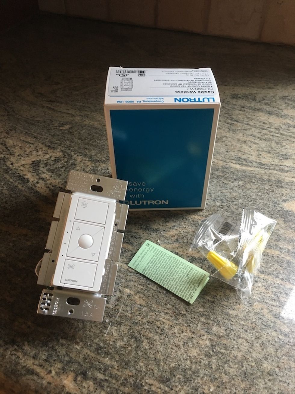 A photo of the contents of Lutron Caseta Wireless smart switch