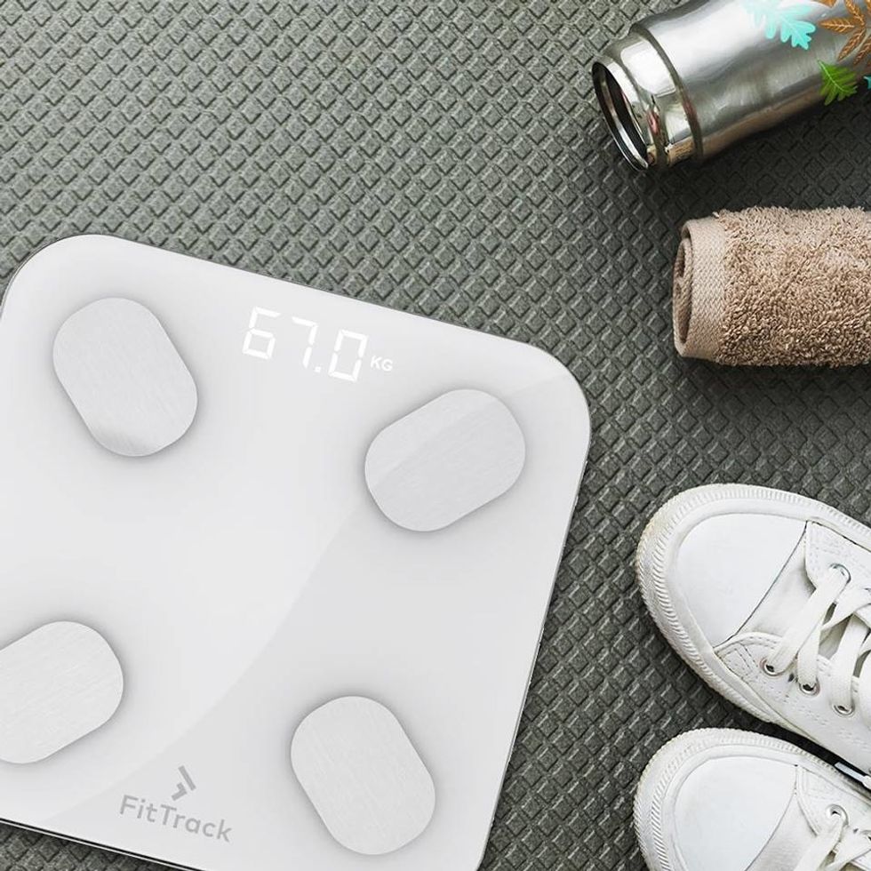 A photo of the FitTrack which lets you plot your muscle mass, body water volume and other health details