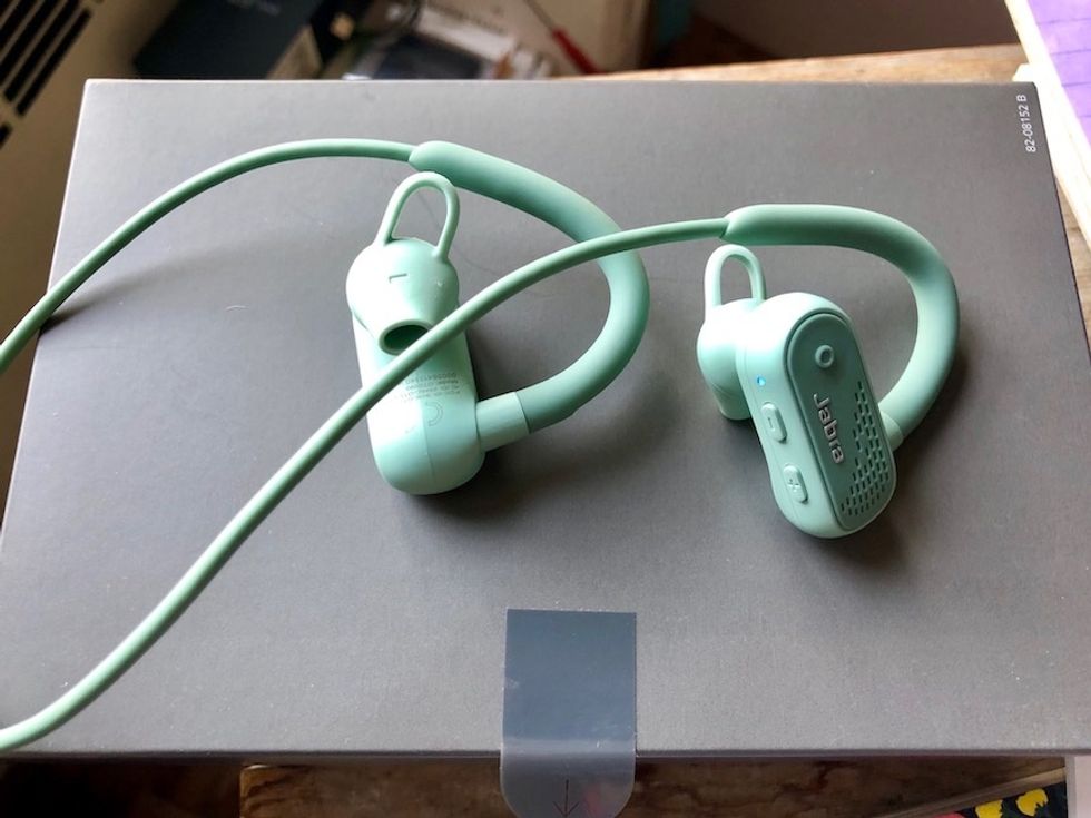 A photo of the Jabra Active Elite 45e earphones in aqua color