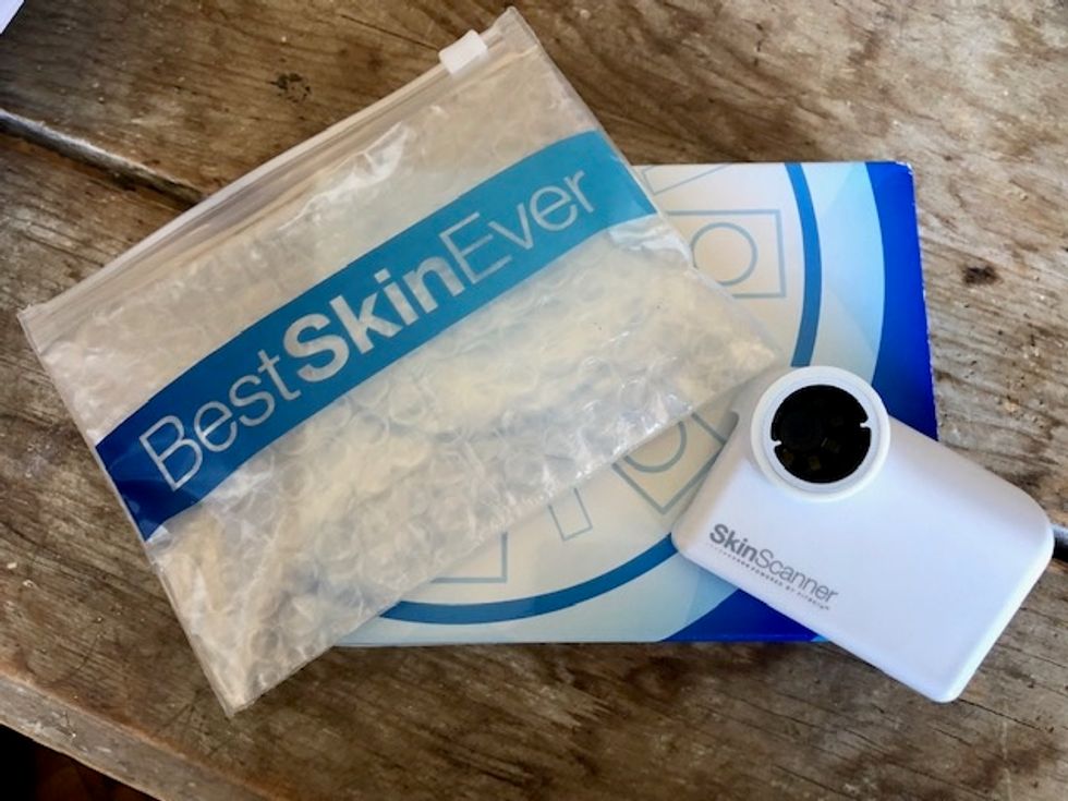 A photo of the Neutrogena Skin Scanner, which fits on top of an iPhone, using a zoom lens to take close ups of your skin