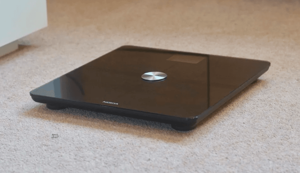 A photo of the Nokia \u200bWithings Body scale, which can keep track of eight users, and their weight journey