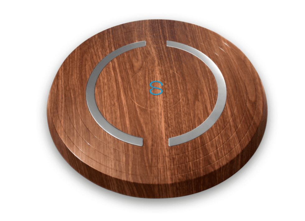 A photo of the Shapa scale, which tracks your goals through color-coded graphs