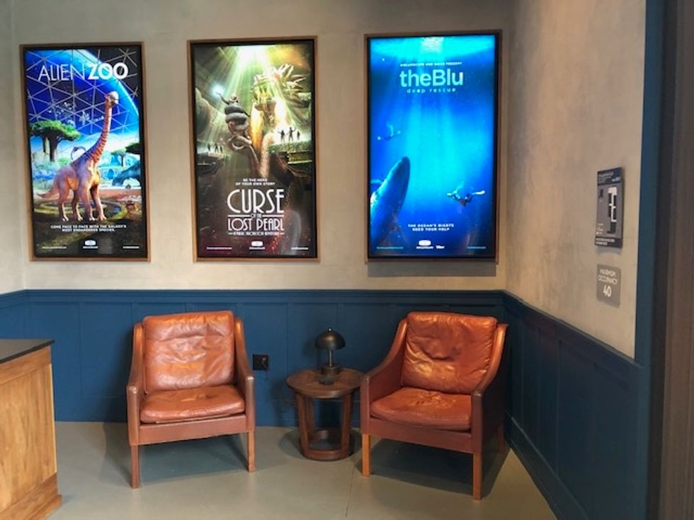 A photo of the three posters for the current line-up at Dreamscape, Alien Zoo, Curse of the Lost Pearl and The Blu