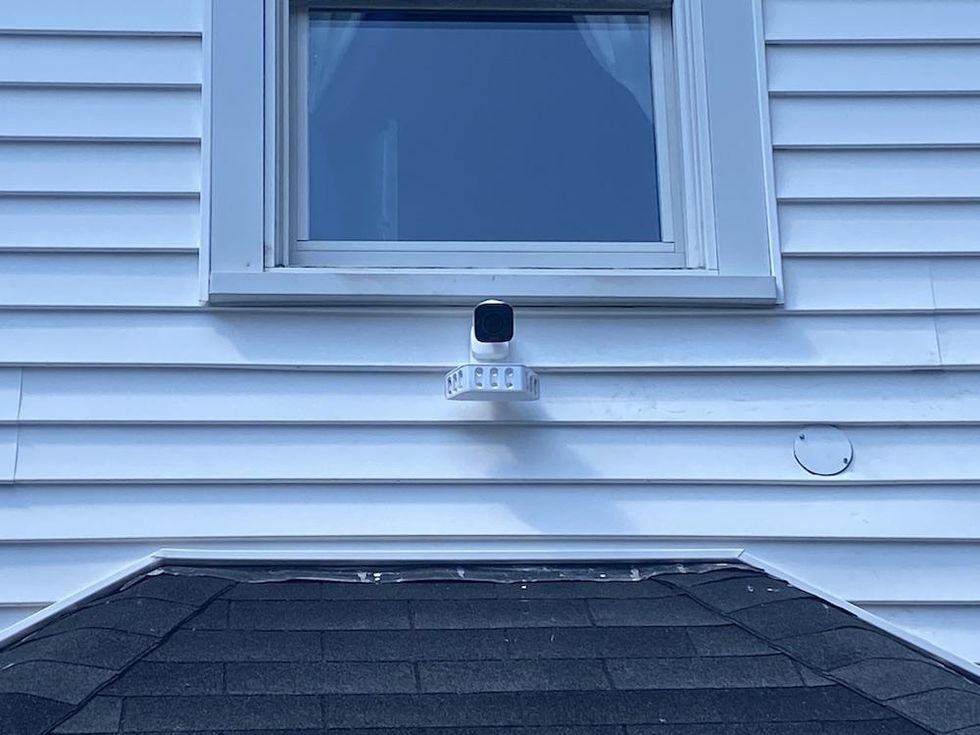a photo of the Vivint Spotlight Pro installed on the side of a house