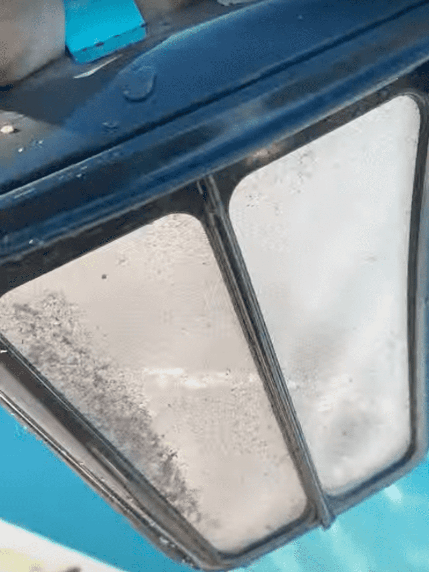 a photo of the waste basket of Aiper Scuba S1 Cordless Robotic Pool Cleaner showing the particles it picked up in the water