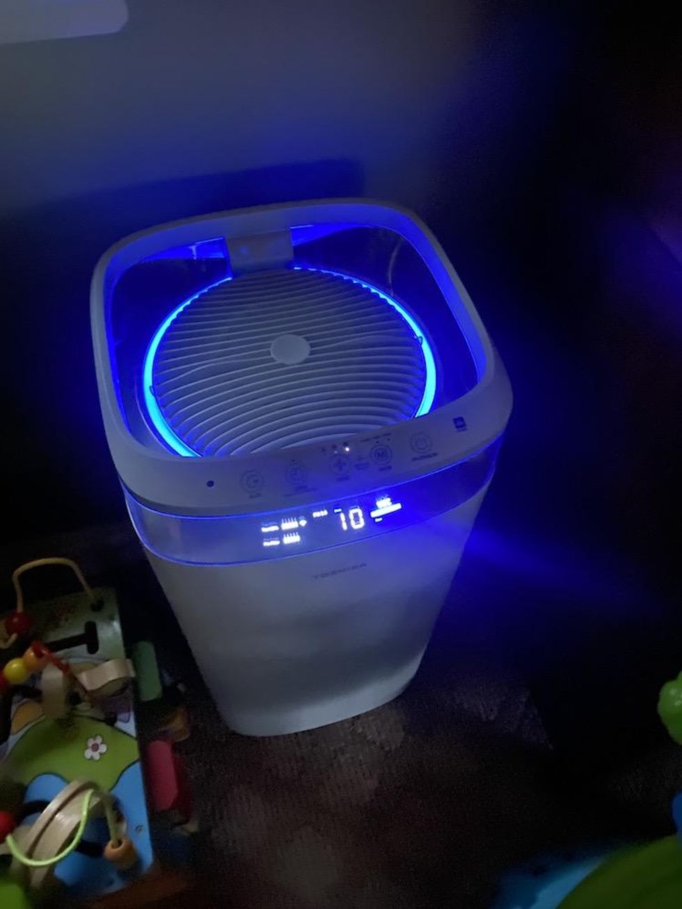 a photo of Toshiba Smart Air Purifier at night