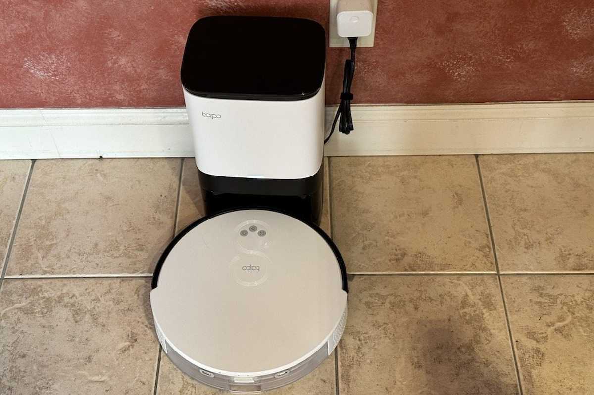 a photo of TP-Link Tapo RV10 Plus Robot Vacuum & Mop + Smart Auto-Empty Dock on the floor