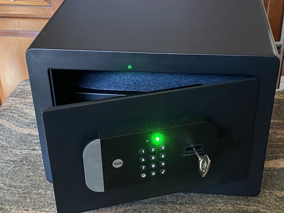 a photo of Yale Smart Safe opening with light on