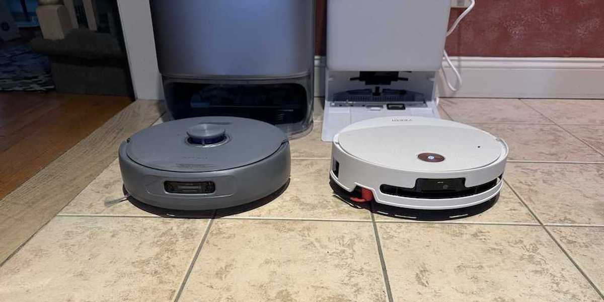 a photo of Yeedi M16 Infinity and Narwal Freo robot vacuums