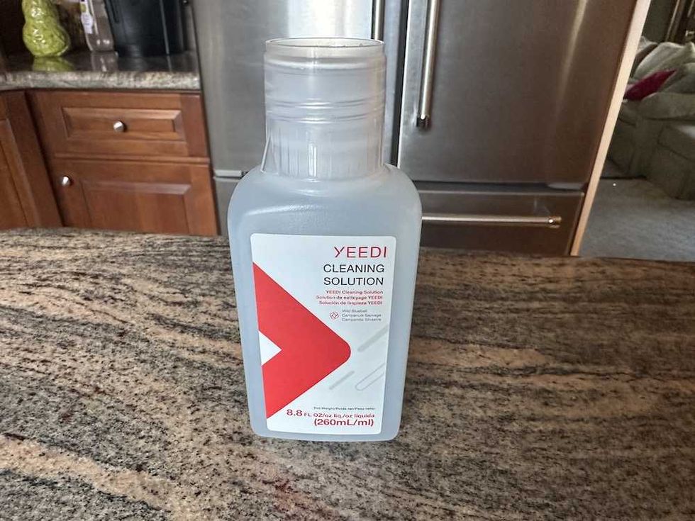 a Photo of Yeedi's Cleaning solujtion on a countertop