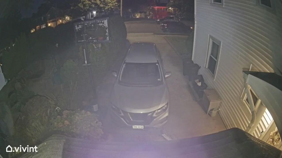 a photo showing glare coming from off the roof below our Vivint Spotlight Pro