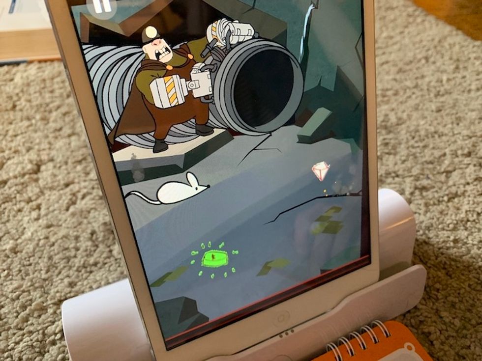 A picture of a rock, drawn by a child, inside the Osmo app