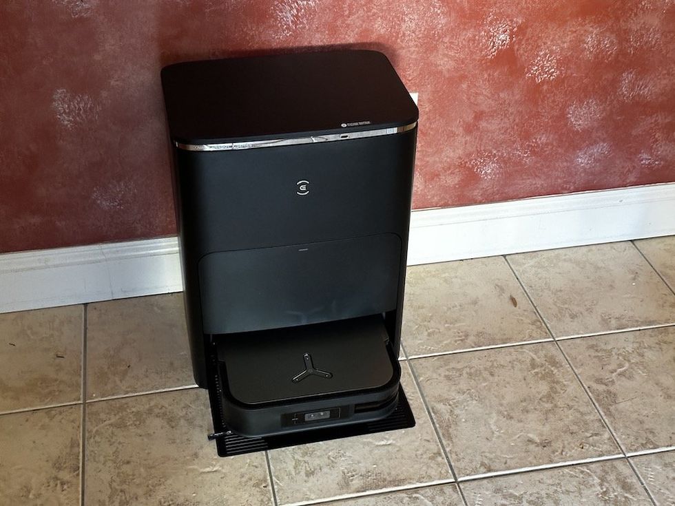 a product shot of Ecovacs DEEBOT X2 OMNI Robot Vacuum & Mop on a floor in a kitchen