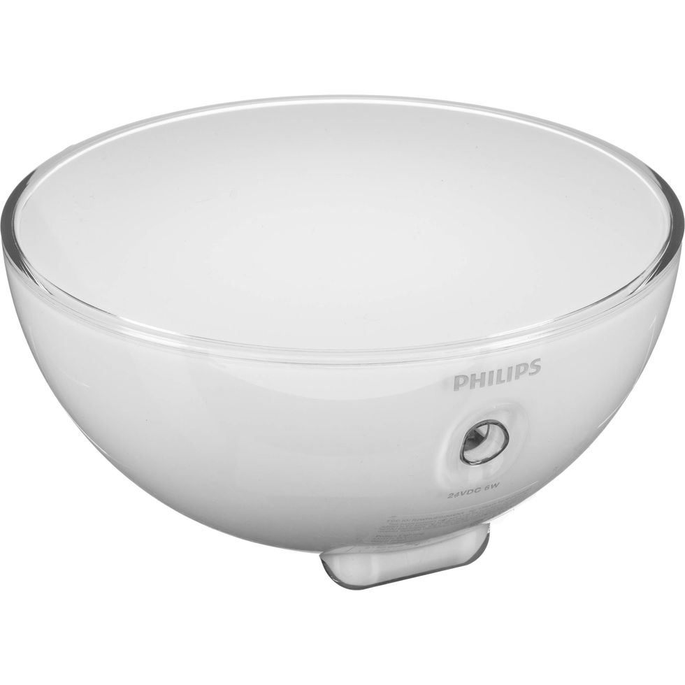 A round white lamp with the word 'Philips" on the front