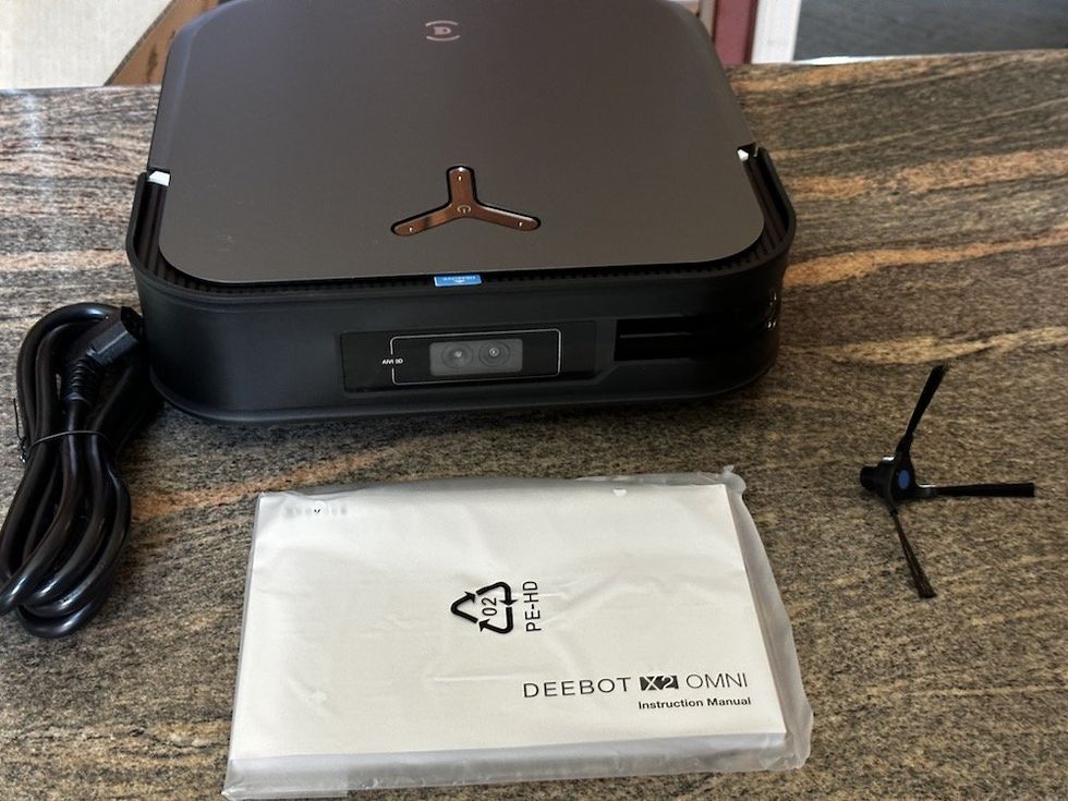 a shot of Ecovacs DEEBOT X2 OMNI Robot Vacuum & Mop unboxed.