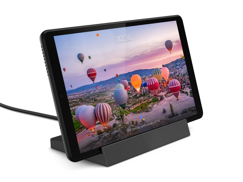 A smart display, seated in a base, with hot air balloons on the screen