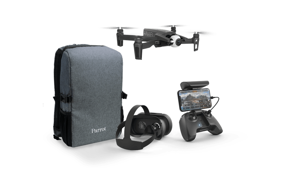 A stock shot of a drone, backpack, glasses and a controller against a white background
