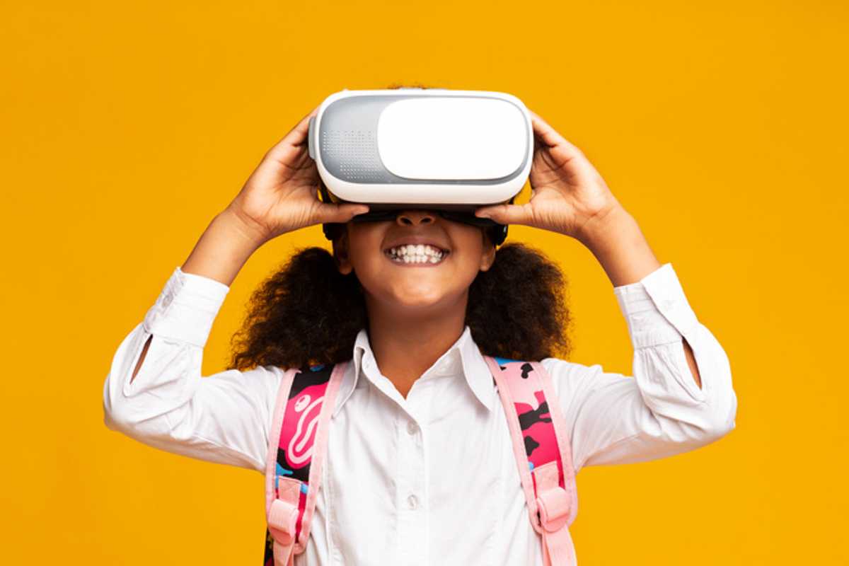 A young child trying a VR headset