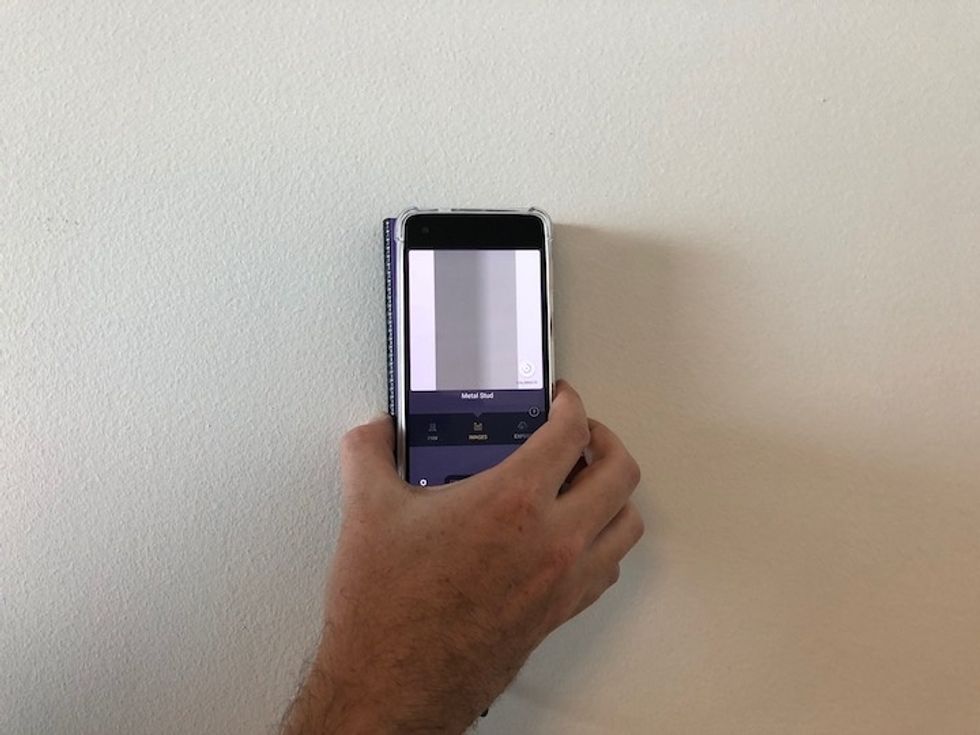 After reading the raw data, Walabot DIY Plus, at work here with an Android smartphone, can bring up a clean visual of what's behind a wall, and even label it clearly.