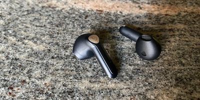 Photo of Soundpeats Air3 Deluxe HS wireless earbuds on a countertop