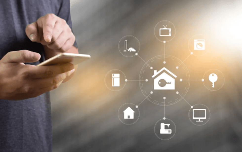 An image of someone operating a smart lock for their home through a smartphone