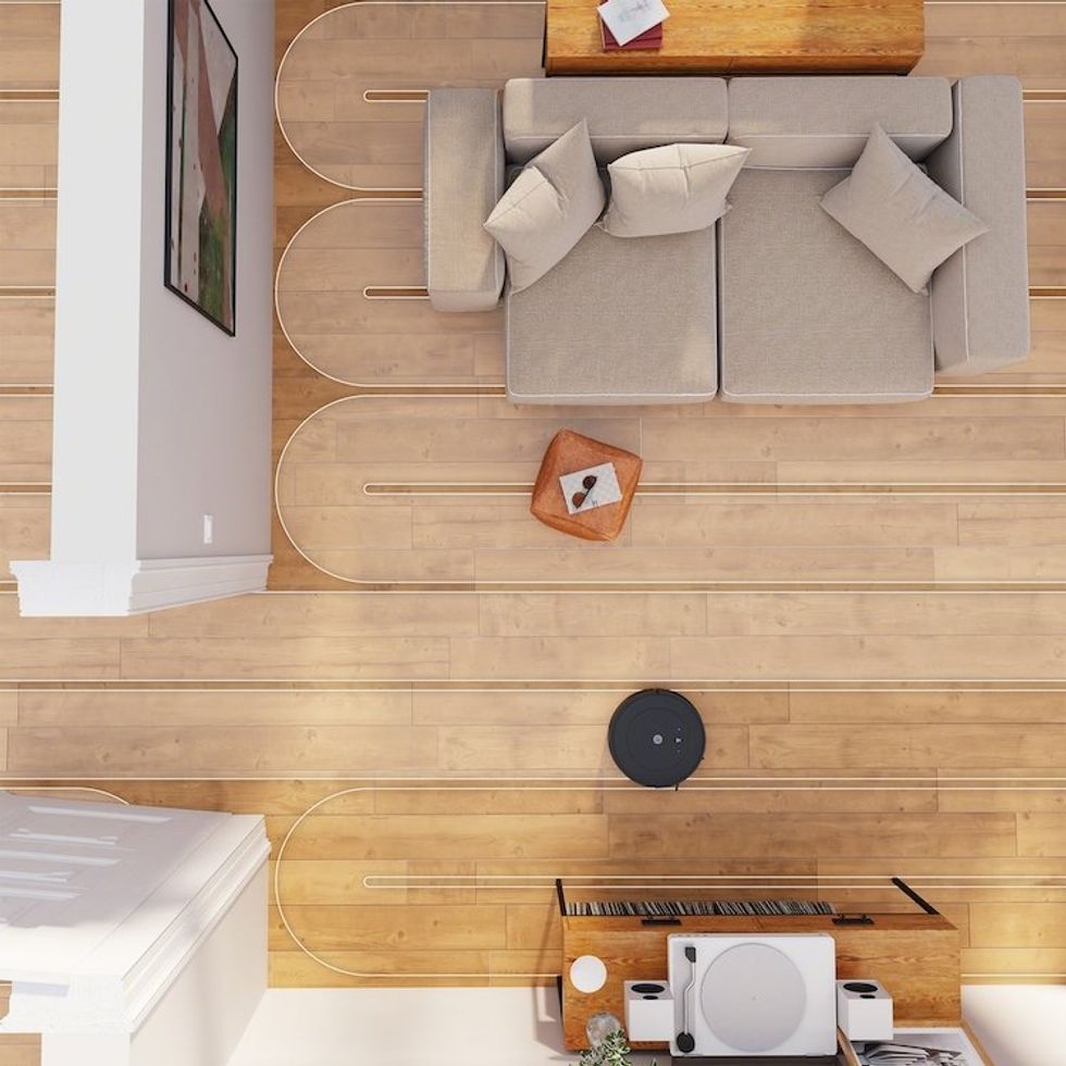 an overview shot of Roomba Combo Essential cleaning the room