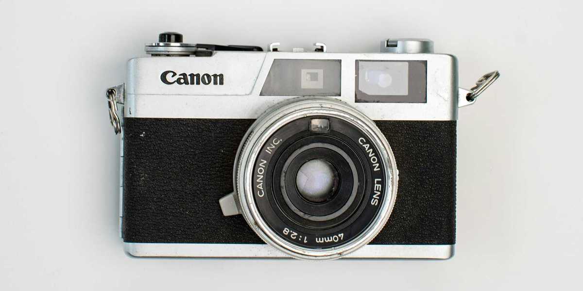 black and silver pentax camera