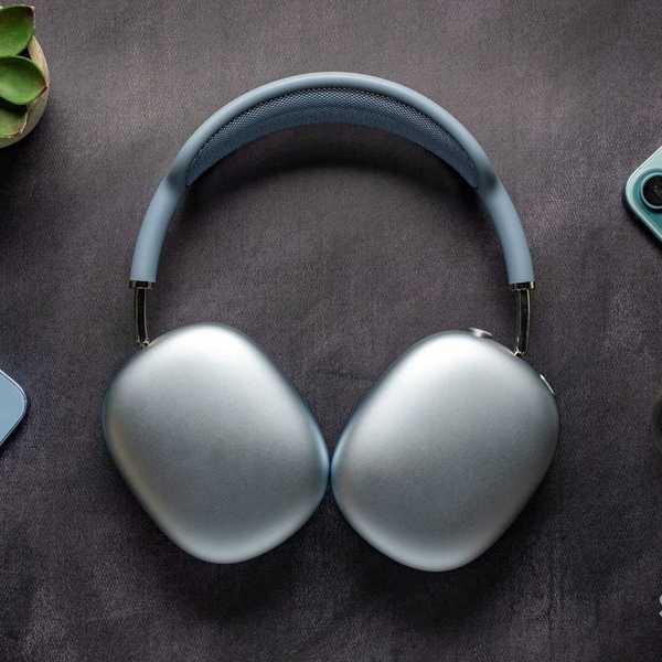 Blue Apple AirPods Max 2 headphones face down on a table showing back ear cups.