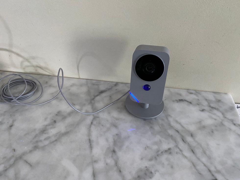 blue by adt indoor camera on a kitchen counter