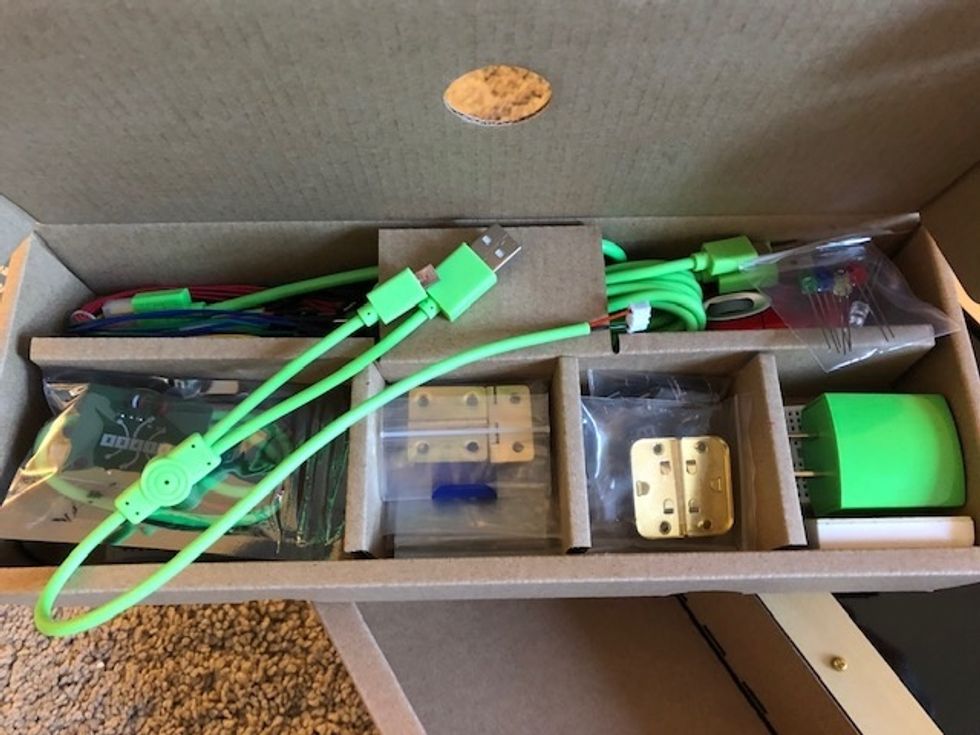 Cables and power cords inside one of the Piper Computer Kit 2 boxes