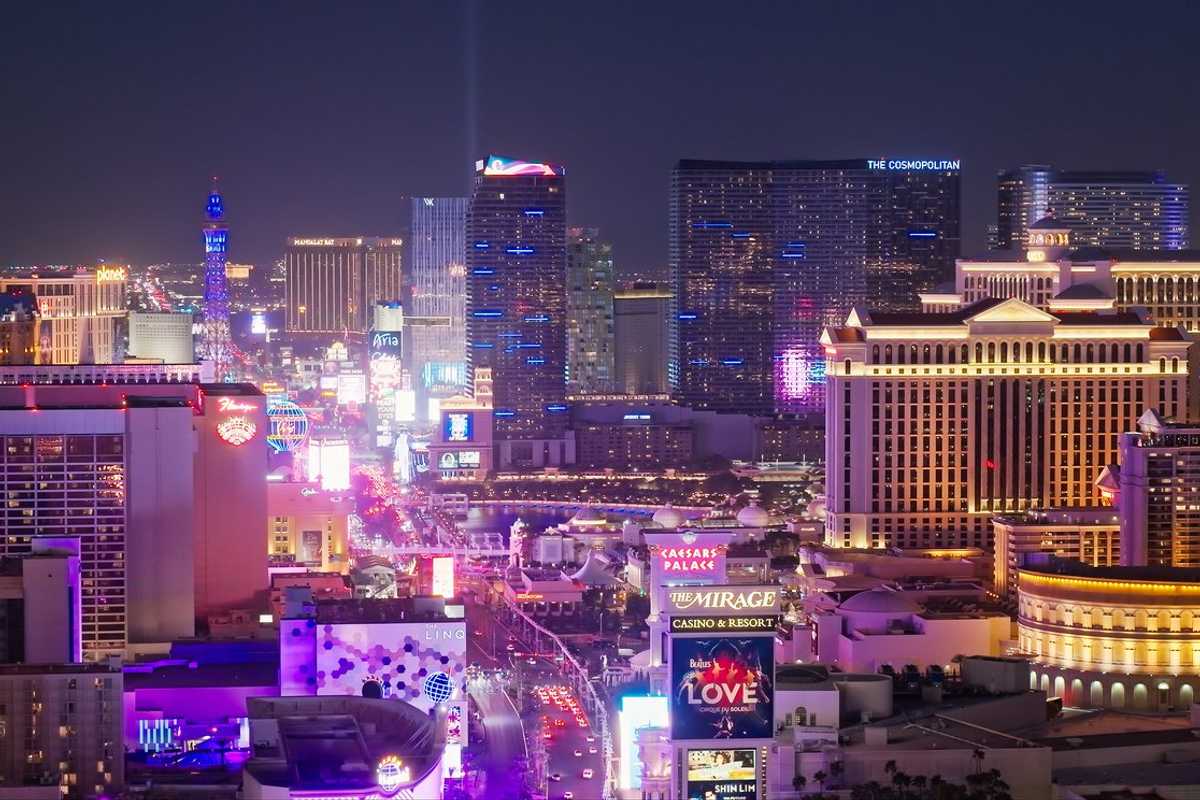 Casinos Along Las Vegas Strip at Night - Aerial stock photo