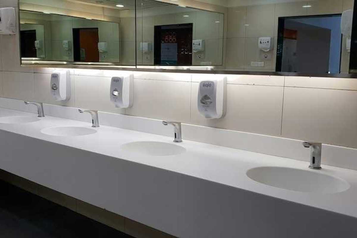 commercial bathroom counters faucets lighting