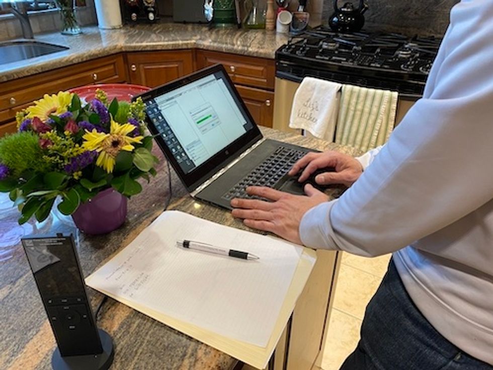 Control4 installer going over plan for installation