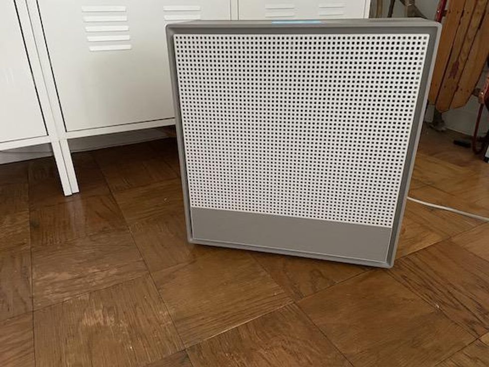 Coway Airmega 250 air purifer is a large air monitoring and purifying device.