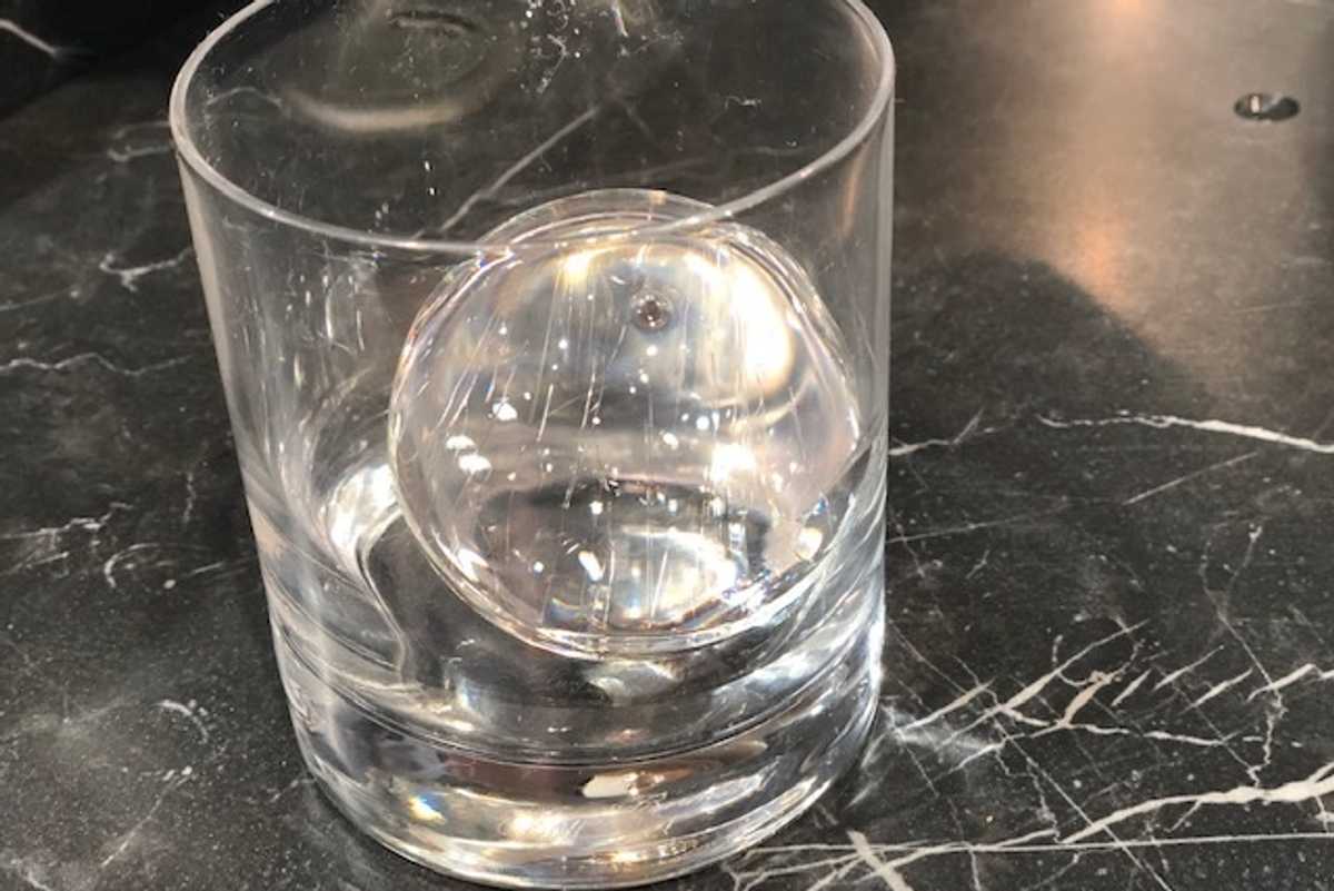 Watch this ice press melt a perfect sphere in seconds