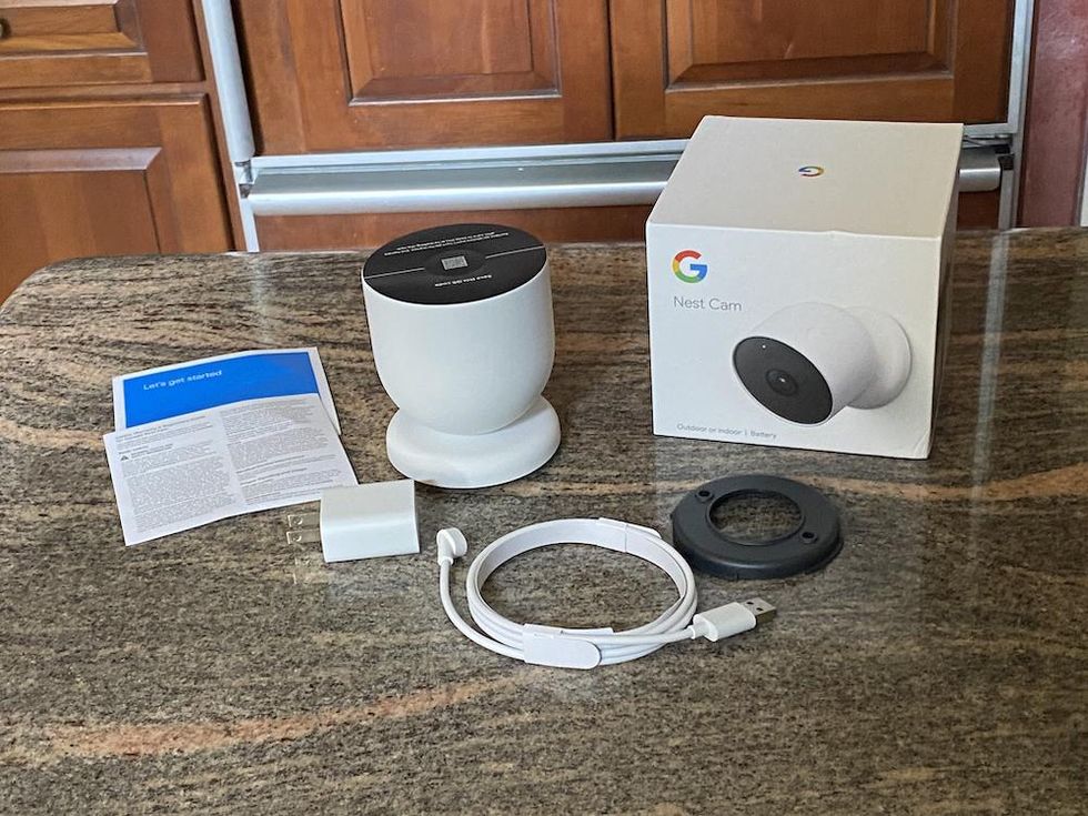 Google nest cam unboxed on a countertop