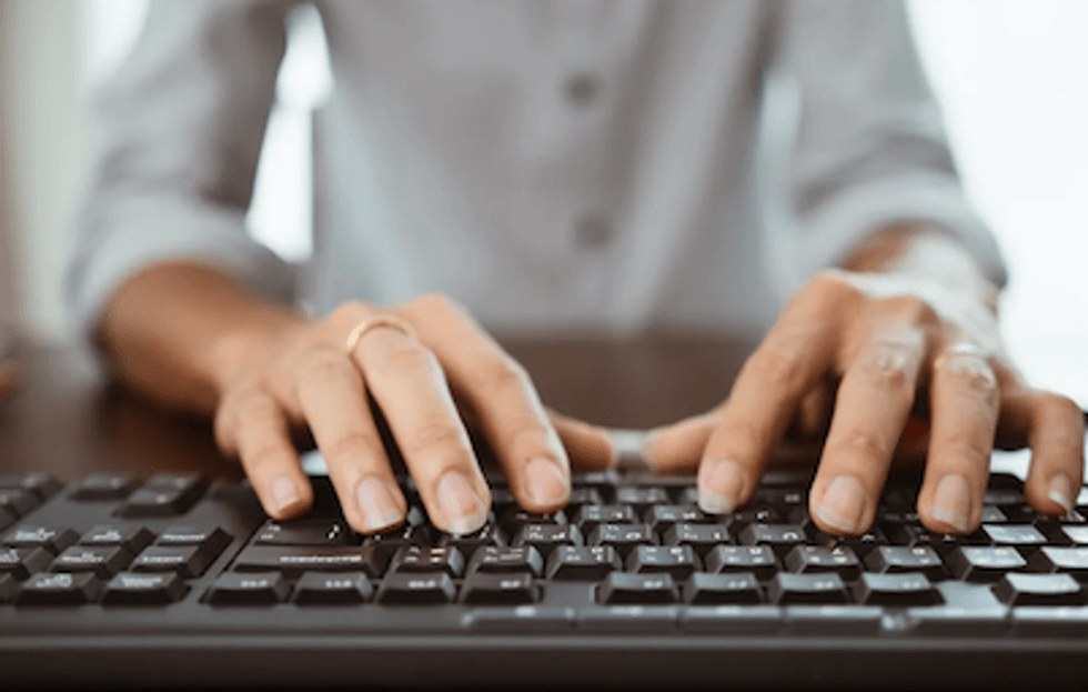 Hands on a keyboard