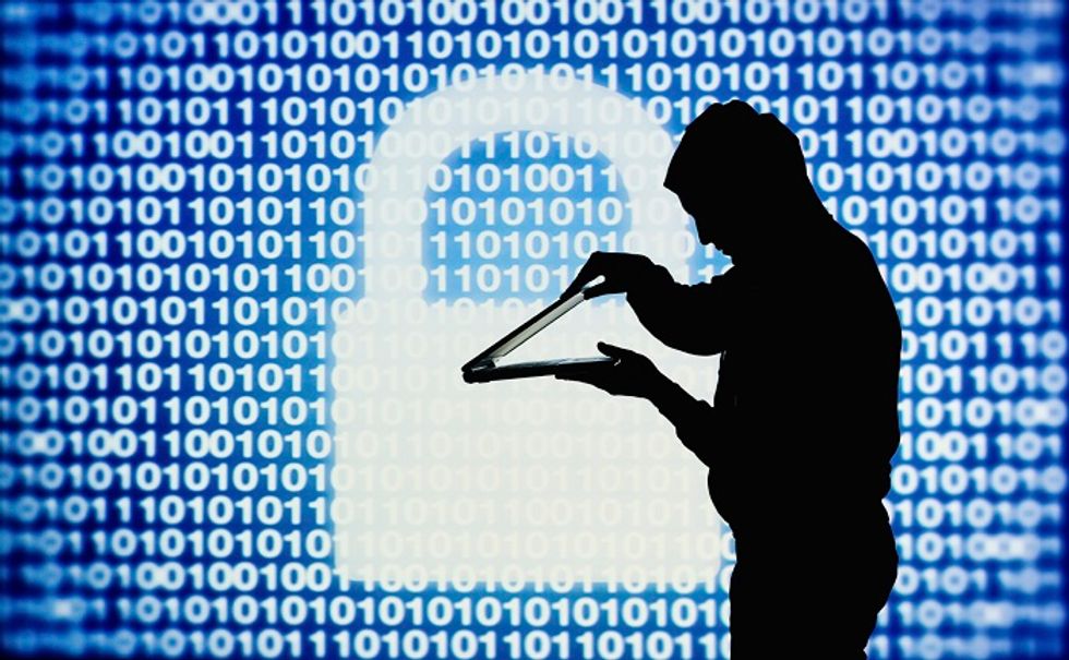 Illustration of a man opening up a laptop in front of a screen with numbers and a padlock image.