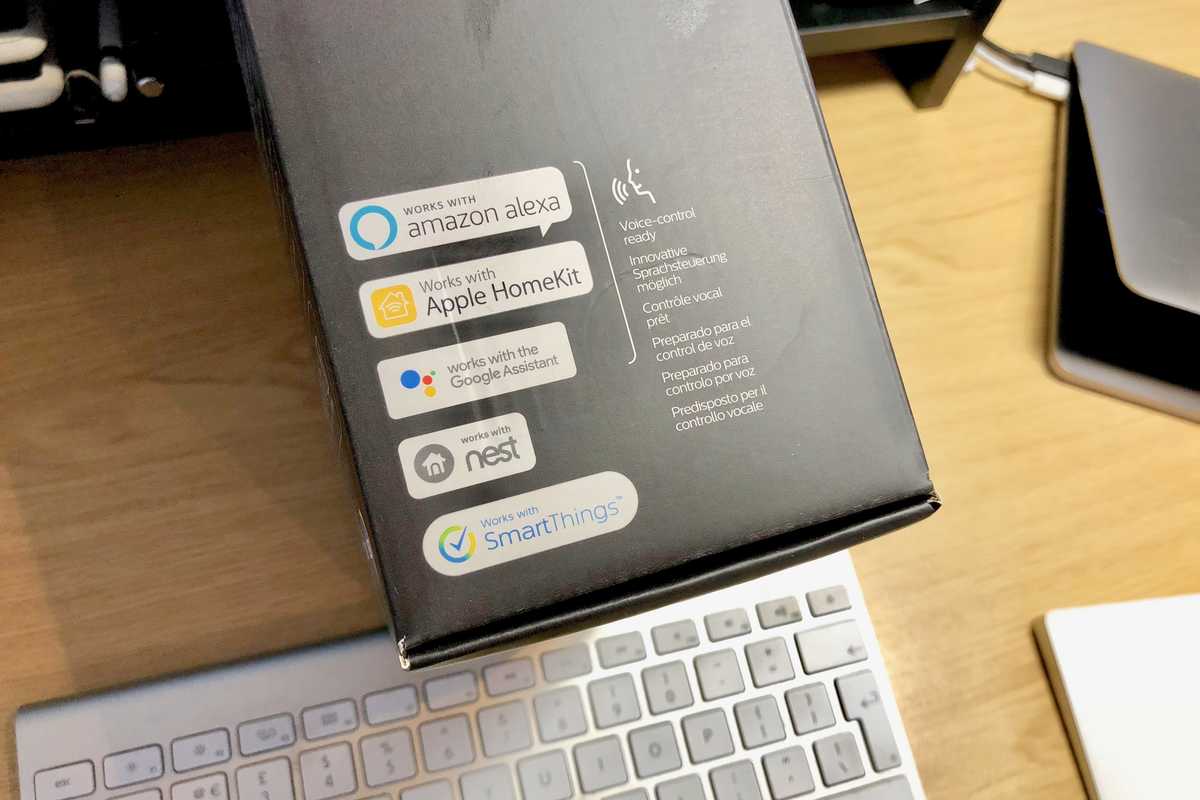 What's the difference between 'works with' Alexa and Google Assistant and built-in