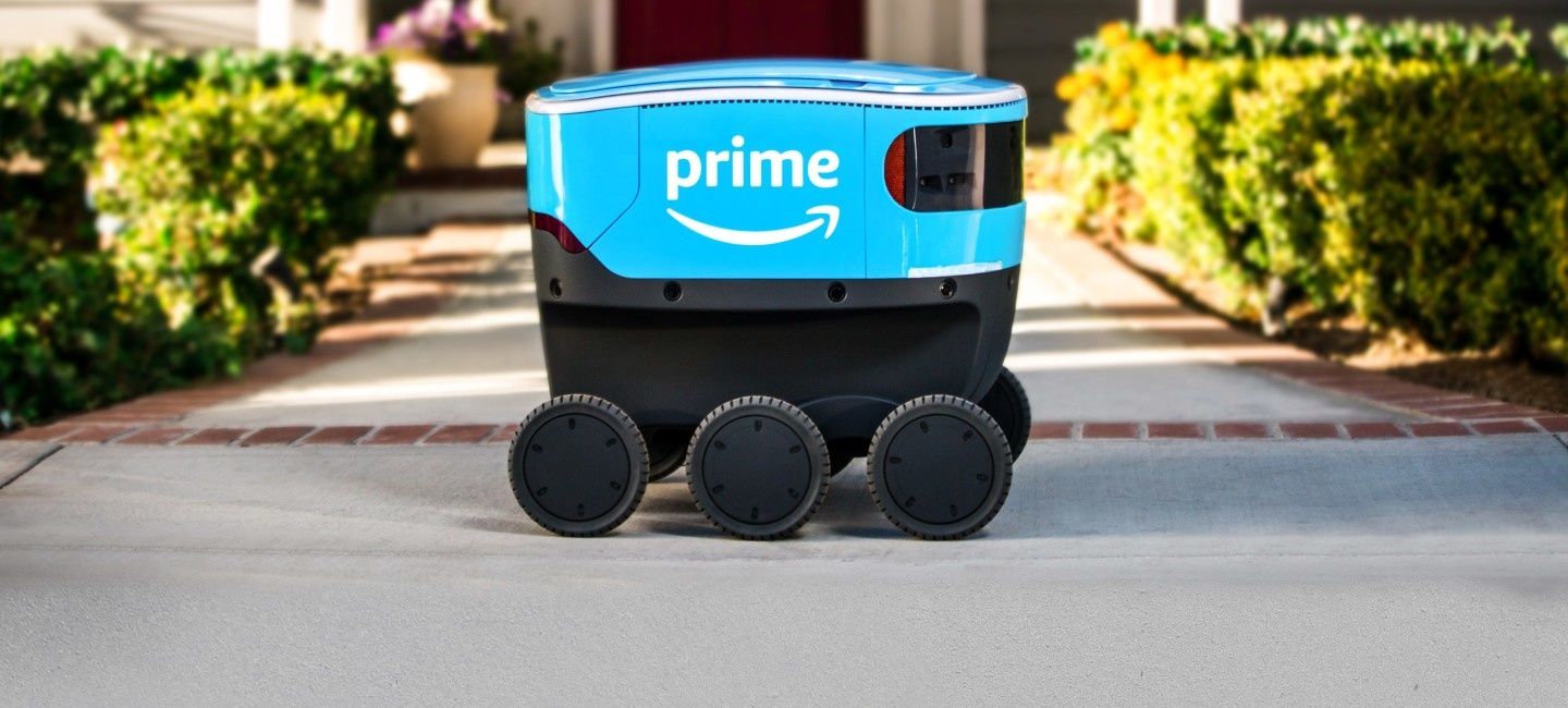 Photo of an Amazon Scout robot with six wheels that is doing deliveries in Snohomish County, WA.